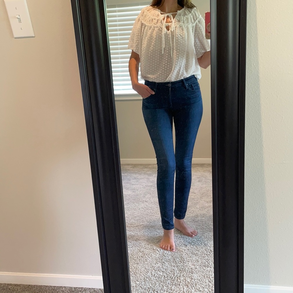 Sheer, white flutter sleeve top